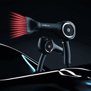 A blow dryer is displayed in a stylized black gradient background. Red rays are coming out of the blow dryer's nozzle to emphasize it's infrared tehcnology.