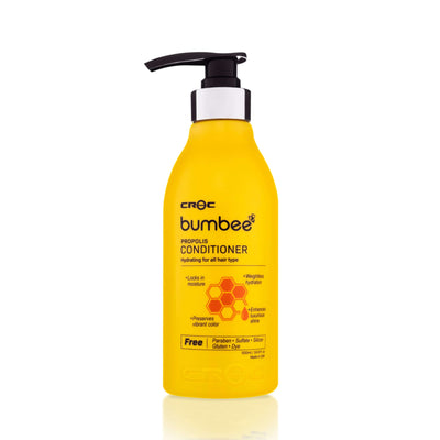 Bright yellow CROC Bumbee Propolis Conditioner bottle with pump, 500ml, free from parabens and sulfates, for all hair types, locking in moisture and enhancing shine.