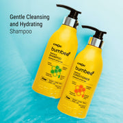 Gentle cleansing propolis shampoo and conditioner bottles floating on a water blue background.