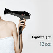 Professional lightweight 13-ounce CROC Premium IC Hair Dryer, shown being held effortlessly to emphasize its ultra-light design.