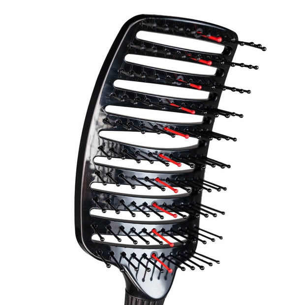 This lightweight, Vented Hair Brush has flexible bristles that let air blow through easily. Its curved design ensures a comfortable brushing experience and can effortlessly detangle any hair type. 